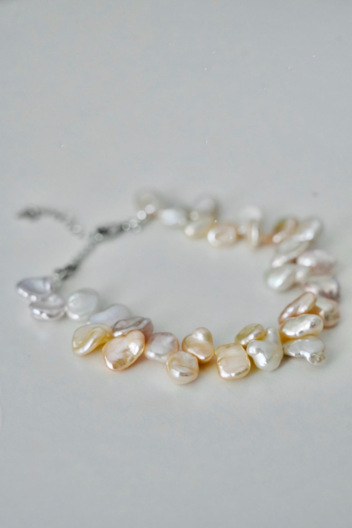 Keshi freshwater pearl bracelet — grey flatlay