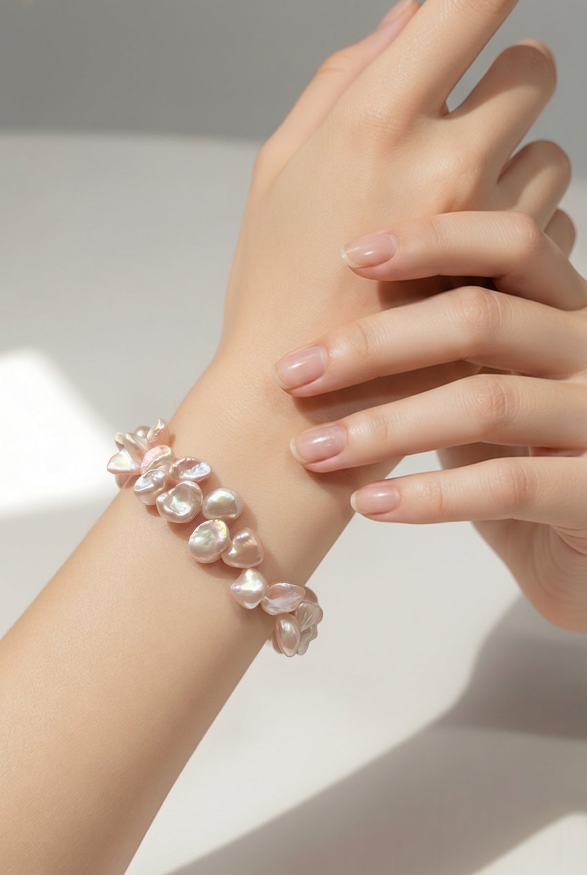 Keshi freshwater pearl sterling silver bracelet — worn on wrist