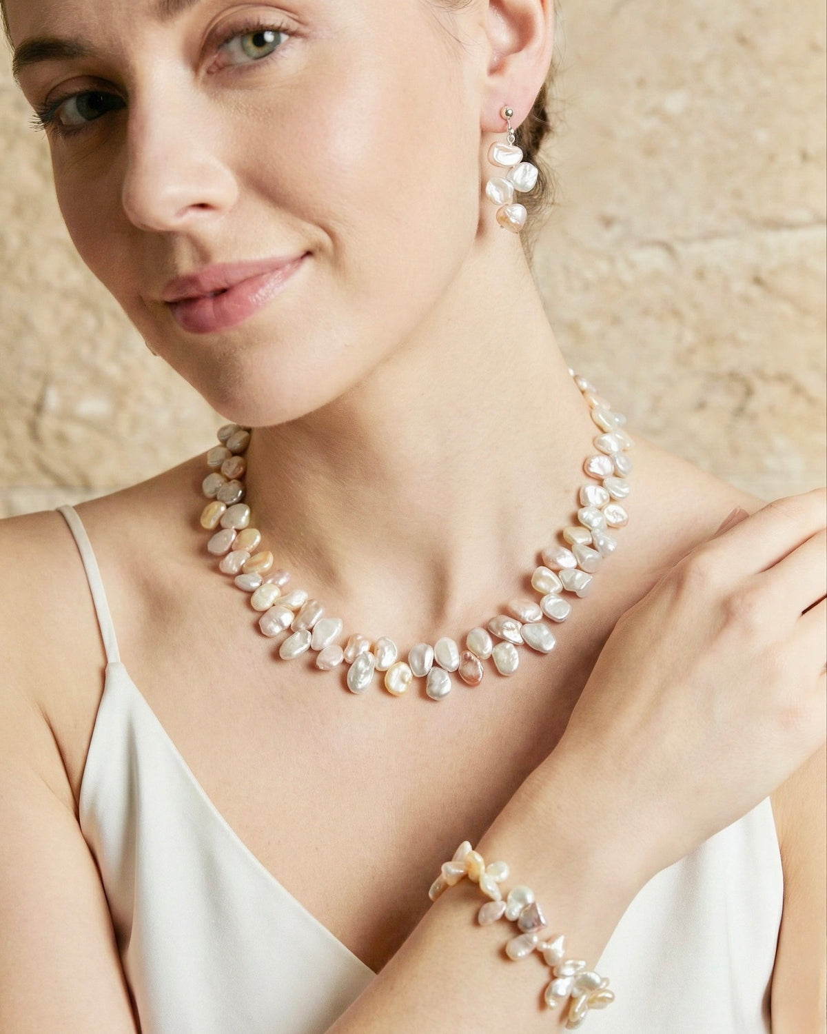 Keshi Collection — model wearing necklace, bracelet & earrings