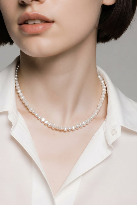 Irregular freshwater pearl necklace — worn on model (white)
